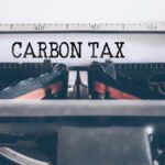 Canadian family reviewing carbon tax rebate Canada documentation after climate action incentive payments discontinued 2025