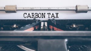 Canadian family reviewing carbon tax rebate Canada documentation after climate action incentive payments discontinued 2025