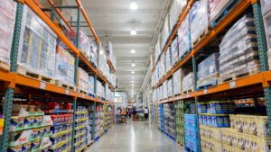 Best grocery stores Canada 2025 comparison showing Costco, No Frills and Walmart storefronts